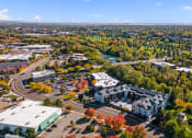 Thumbnail 6 of 48 - an aerial view of a city with trees and buildings at River Walk Apartments, Boise, ID, 83702