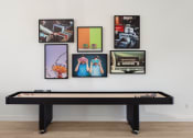 Thumbnail 12 of 45 - a wall with pictures and a pool table at The Expo, Billings, Montana