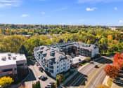 Thumbnail 3 of 48 - an aerial view of an apartment building in the city at River Walk Apartments, Boise, ID