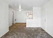 Thumbnail 18 of 26 - Carpeted Living Area at Country Oaks Apartments, Clearfield Utah