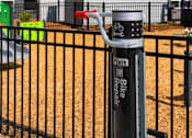 Thumbnail 65 of 98 - A black fence with a bike repair station in front of it at The Beaumont Apartments, Bozeman