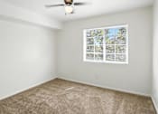 Thumbnail 16 of 26 - Carpeted Bedroom at Country Oaks Apartments, Clearfield, UT