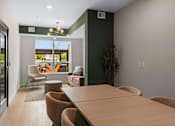 Thumbnail 43 of 98 - A conference room with a long table at The Beaumont Apartments, Bozeman, Montana 59715