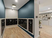Thumbnail 54 of 98 - Resident mail room with black mail boxes and wooden floors at The Beaumont Apartments, Montana, 59715