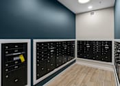 Thumbnail 53 of 98 - A row of black mailboxes with numbers on them at The Beaumont Apartments, Montana