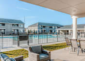 Thumbnail 20 of 28 - the preserve at ballantyne commons pool and patio with chairs and tables