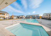Thumbnail 26 of 28 - the preserve at ballantyne commons pool and apartment buildings