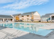 Thumbnail 25 of 28 - the preserve at ballantyne commons pool with apartment buildings in the background
