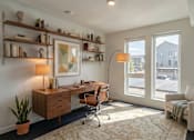 Thumbnail 31 of 31 - A room with a desk, chair, and a window overlooking a street at The Clara in Eagle, ID 83616
