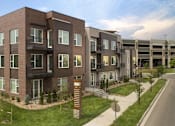 Thumbnail 11 of 67 - a rendering of an apartment building on a city street at Cycle Apartments, Fort Collins, CO, 80525
