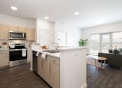 Thumbnail 10 of 29 - A modern kitchen with wooden cabinets and a white island.