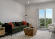 Thumbnail 5 of 28 - a living room with a green couch and a large window at Crosshatch, Garden City, ID