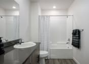 Thumbnail 9 of 28 - a bathroom with a sink toilet and shower at Crosshatch, Garden City, ID