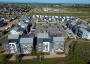 Thumbnail 36 of 37 - Aerial Exterior View Of Buildings at West Village at Four Points, Bozeman, 59718