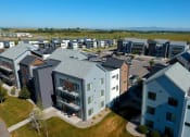 Thumbnail 29 of 37 - Aerial View Of Apartment Building at West Village at Four Points, Montana