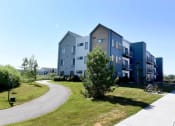 Thumbnail 5 of 37 - Beautiful Courtyard With Walking Paths at West Village at Four Points, Bozeman, Montana