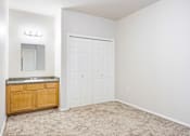 Thumbnail 16 of 23 - A white door is in a white wall.