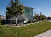 Thumbnail 3 of 46 - green house with tree in front at Great Northern, Montana, 59808