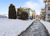 Thumbnail 41 of 46 - snow-covered pathway leads to residential area at Great Northern, Missoula Montana