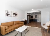 Thumbnail 16 of 45 - Living room area with sofa at The Expo Apartments, Billings, MT, 59106