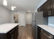 Thumbnail 34 of 45 - Kitchen at The Expo Apartments, Billings, 59106