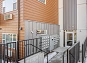 Thumbnail 17 of 31 - A modern building with a wooden exterior at Majestic Drive, Missoula