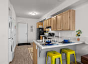 Thumbnail 4 of 31 - A kitchen with a washer and dryer built in at Majestic Drive, Montana, 59808