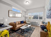Thumbnail 3 of 31 - A living room with a brown couch at Majestic Drive, Missoula Montana