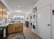 Thumbnail 9 of 31 - A modern kitchen with wooden cabinets at Majestic Drive, Missoula, MT
