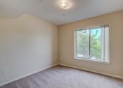 Thumbnail 28 of 48 - Bedroom with window at River Walk Apartments, Boise
