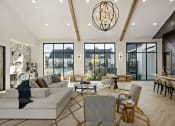 Thumbnail 6 of 29 - a living room with a couch and a table at Seasons at Meridian, Meridian, ID