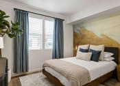 Thumbnail 24 of 29 - Bedroom with cozy bed at Seasons at Meridian, Idaho