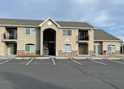 Thumbnail 3 of 4 - A building with the number 8600 on it.
