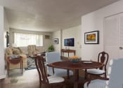 Thumbnail 31 of 44 - Living Room With Television at Highland Club Apartments at Watervliet, NY 12189