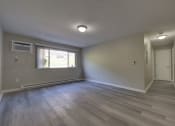 Thumbnail 21 of 44 - Empty Living Room at Highland Club Apartments, Watervliet, NY 12189