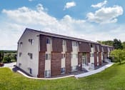 Thumbnail 8 of 44 - Elegant Exterior View at Highland Club Apartments, Watervliet, NY 12189