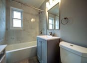 Thumbnail 8 of 23 - Bathroom with tub and sink at Garwood Gardens Apartments, Garwood, New Jersey