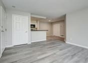 Thumbnail 15 of 41 - an empty living room and kitchen in a new home at Boulder Pointe Apartments in Middletown, NY 10940