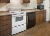 Thumbnail 4 of 45 - Bright Kitchen at Cedar Park Apartments, New York, 12180