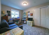 Thumbnail 35 of 45 - Living room with a couch and a tv at Cedar Park Apartments, Troy, NY, 12180