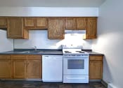 Thumbnail 9 of 45 - Elegant And Timeless Kitchen at Cedar Park Apartments, New York, 12180