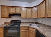 Thumbnail 11 of 45 - Modern appliances with fully equipped kitchen at Cedar Park Apartments, Troy, 12180