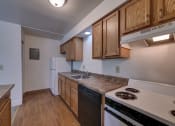Thumbnail 7 of 45 - Fully Furnished Kitchen With Stainless Steel Appliances at Cedar Park Apartments, New York, 12180
