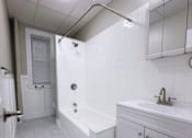 Thumbnail 7 of 27 - White Bathroom at Willett Apartments, New York, 12210