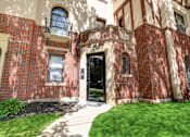 Thumbnail 9 of 10 - A red brick building with a black door and windows.