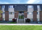Thumbnail 6 of 44 - Front view of the apartment building at Highland Club Apartments, Watervliet, NY 12189