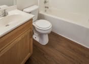 Thumbnail 7 of 33 - a bathroom with a toilet and a sink