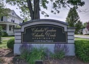 Thumbnail 29 of 30 - a sign for columbia gardens apartments