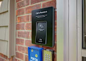 Thumbnail 38 of 41 - A sign on a wall that says "Call a Resident" is displayed.