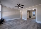 Thumbnail 14 of 27 - Unfurnished room with fan at Willett Apartments, Albany, New York